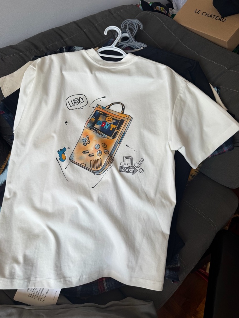 Cream Graphic Tee with Vintage Game Console Print